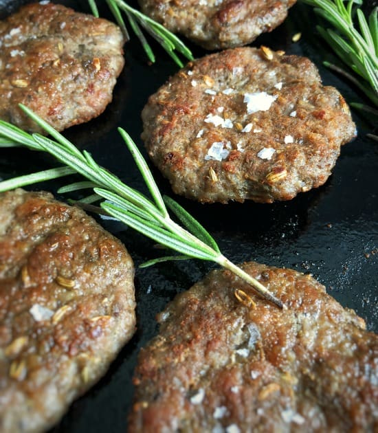 breakfast sausage on a cast iron skillet