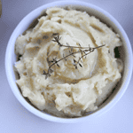 These creamy horseradish mashed potatoes add a great kick to a classic side dish using prepared horseradish. This recipe can be made on the stovetop or in your instant pot. #whole30 #paleo #sidedish