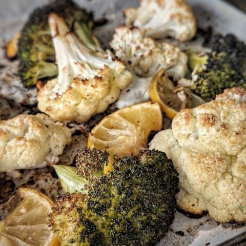 https://thymeandjoy.com/wp-content/uploads/2018/12/Roasted-Broccoli-_-Cauliflower-with-Lemon-_-Garlic-2-480x480.jpeg