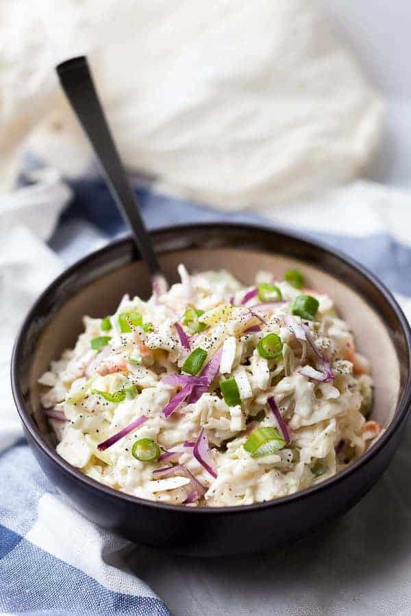 Whole30 Coleslaw on a blue and white table cloth