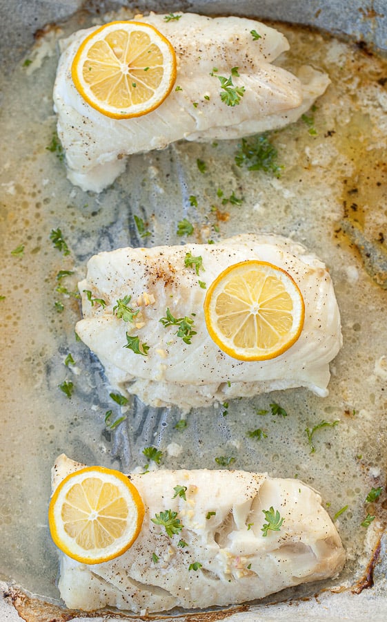 Garlic Butter Baked Cod on a cooking sheet