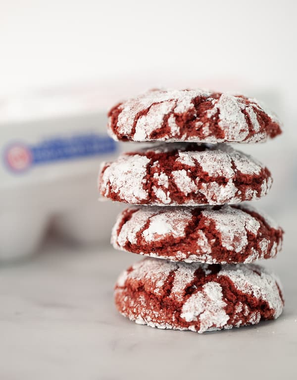 red velvet crinkle cookies in a stack