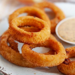 air fryer alexia onion rings on a white plate