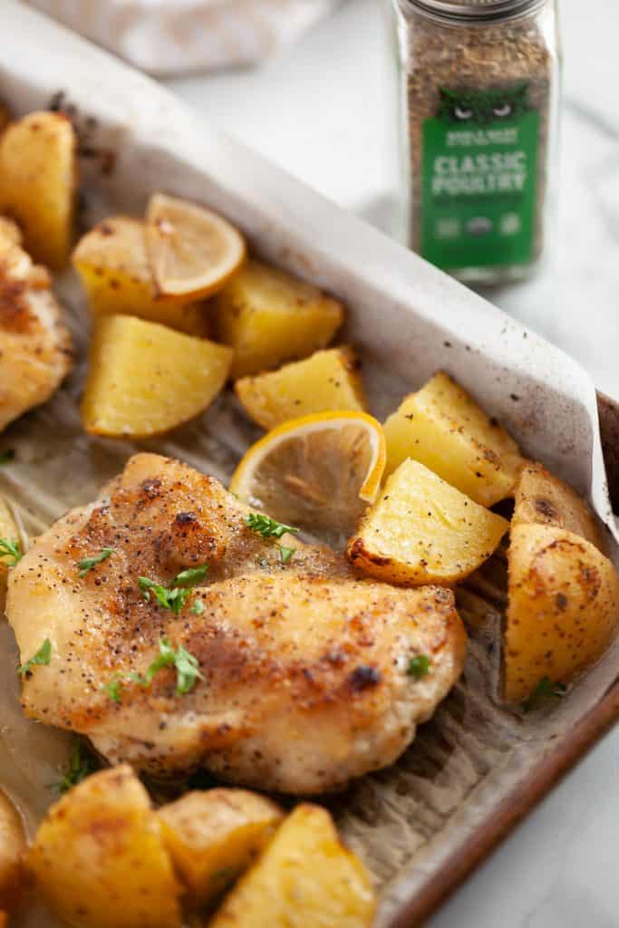 herbed chicken thighs on a sheet pan