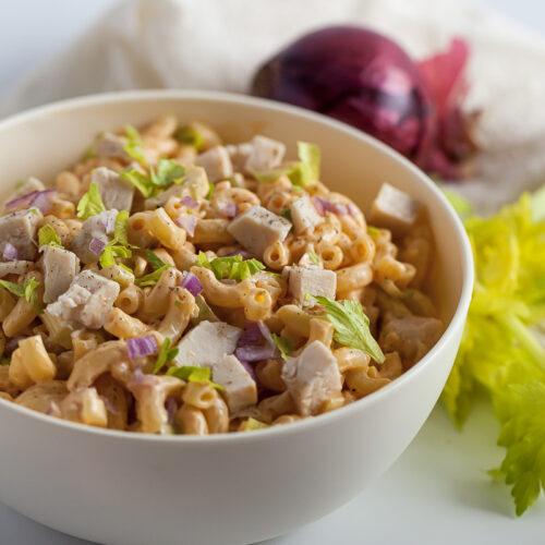 a bowl of buffalo chicken pasta salad