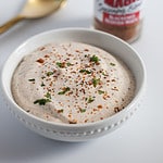ranch dressing in a bowl with blackened seasoning