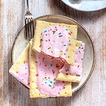pink pop tarts on a plate with a fork