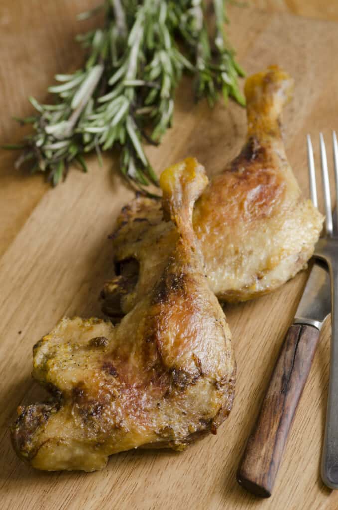 cooked duck legs with rosemary