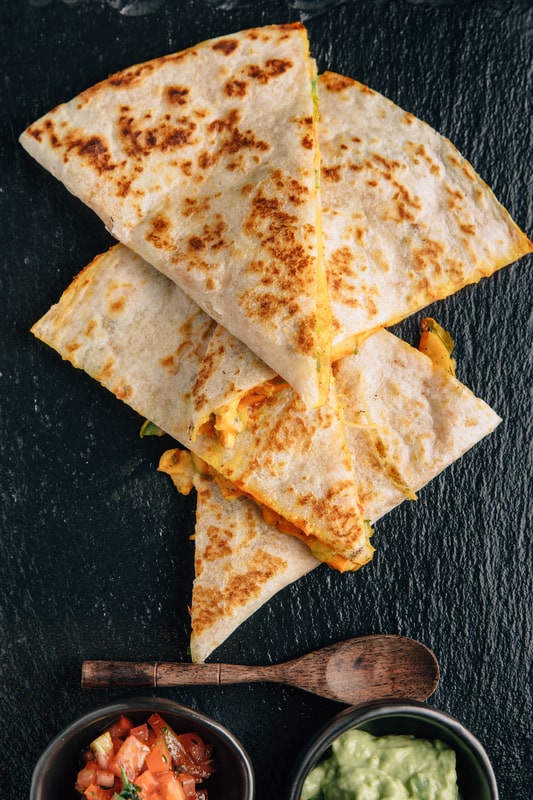 cheese quesadilla cut into triangles