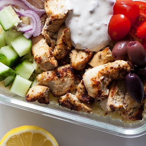 greek chicken bites in a meal prep container