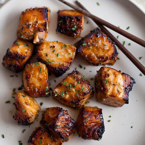 bite sized pieces of salmon marinated in honey garlic