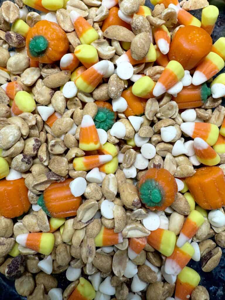 candy corn snack mix with peanuts and white chocolate