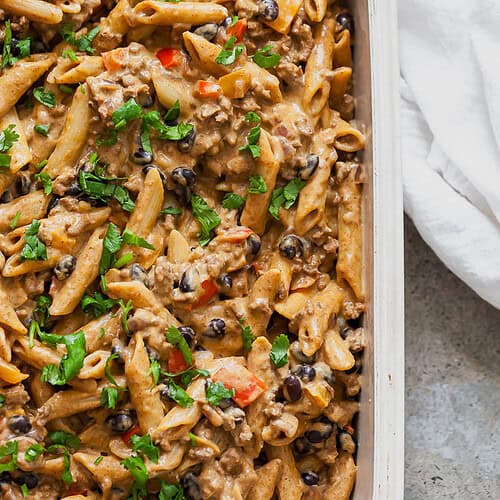 Penne pasta with creamy taco sauce topped with cilantro